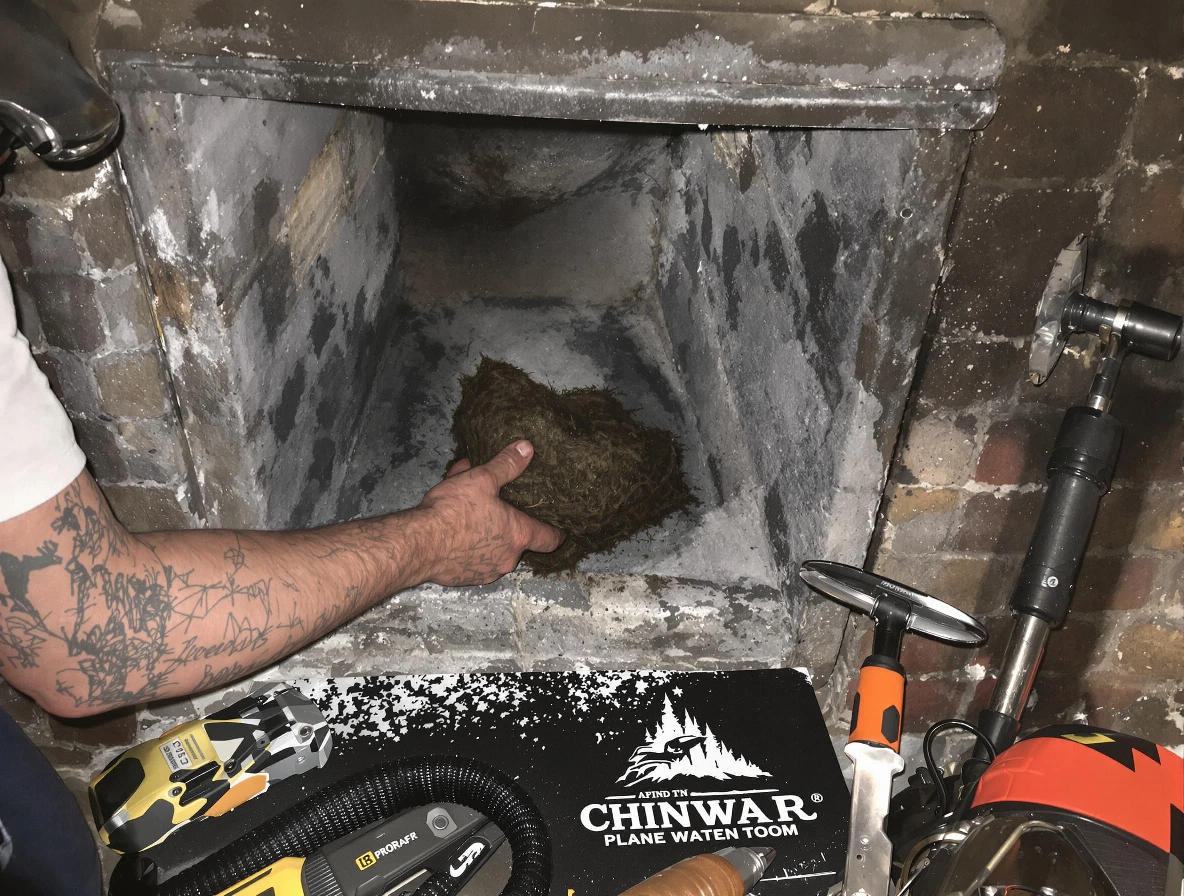 Marlboro Chimney Sweep safely removing debris and screening chimney in Marlboro, NJ